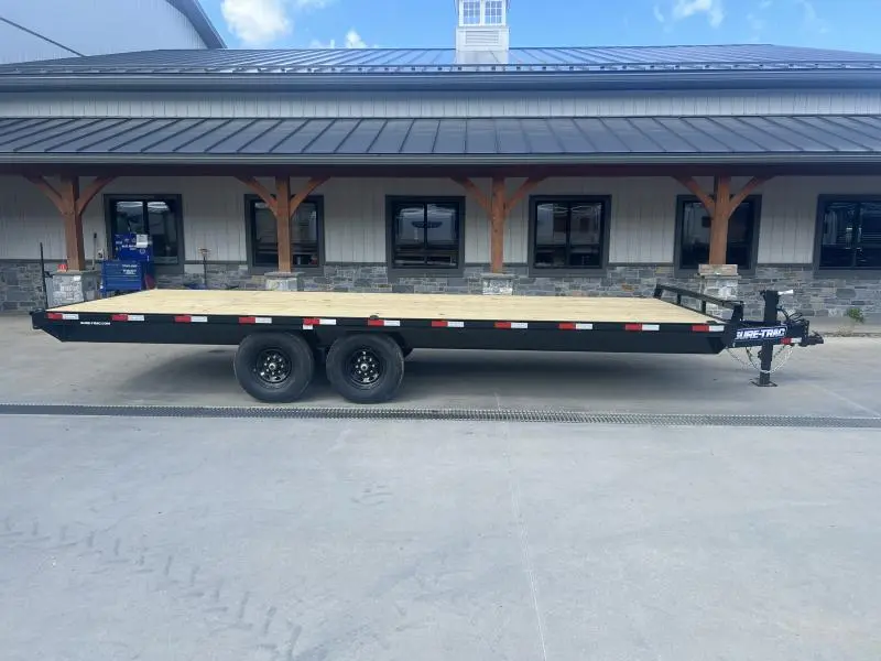 2024 Sure-Trac 102x22 Flatbed Deckover Trailer 15000# GVW * 8' SLIDE IN RAMPS * 10" I-BEAM MAINFRAME * CHANNEL SIDE RAIL * RUBRAIL/STAKE POCKETS/D-RINGS * ADJUSTABLE COUPLER * 12K DROP LEG JACK * LED'S