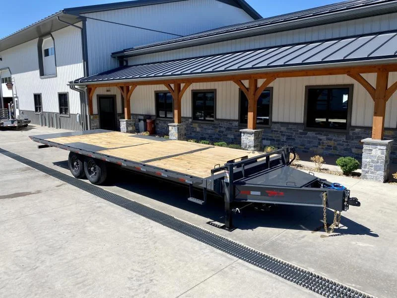 2023 Sure-Trac 102x16 Flatbed Deckover Trailer 9900# GVW * 8' SLIDE IN PUNCH PLATE RAMPS * TUBE SIDE RAIL + CROSSMEMBERS * RUBRAIL/STAKE POCKETS/D-RINGS * SPARE MOUNT * ADJUSTABLE COUPLER * DROP LEG JACK